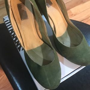 Forest green slip ons with a 2” heel.